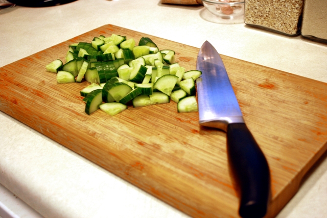 Cucumbers being chopped